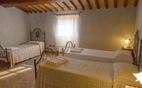 Casa la Primula: Furniture, Flooring, Bedroom, Floor, Bed, Bed Frame, Bedding, Linens, Bed Sheet, Hotel