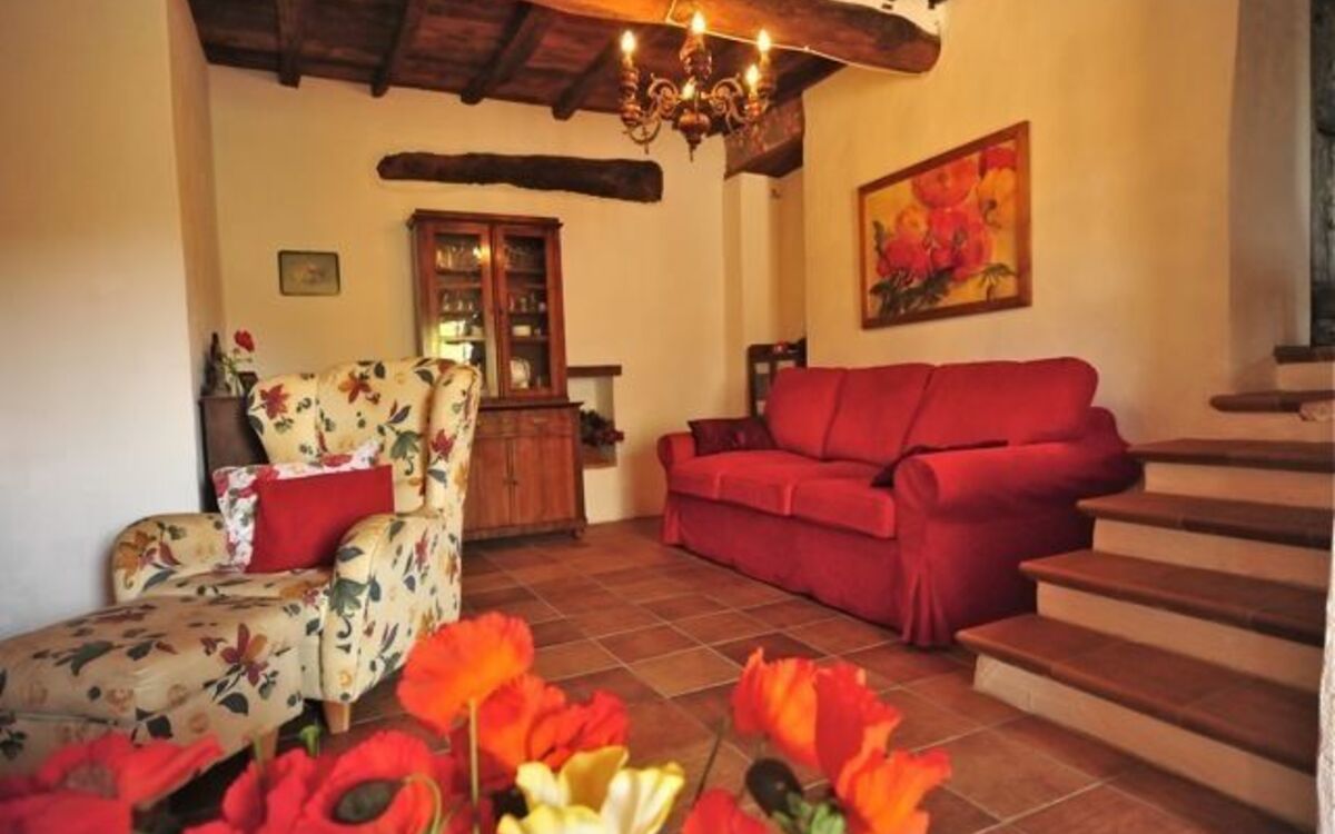 Living Room with sofa bed and open fireplace