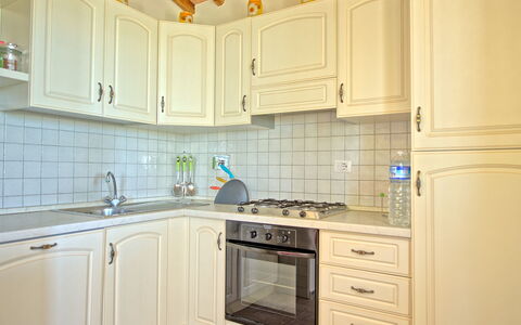 Villa Roberto: Cabinetry, Countertop, Room, Property, Kitchen, Furniture, Tile, Interior Design, Lighting, Home