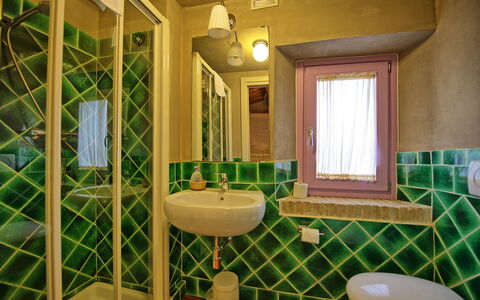 Villa Marginone: Bathroom, Room, Property, Green, Interior Design, Building, House, Tile, Architecture, Real Estate