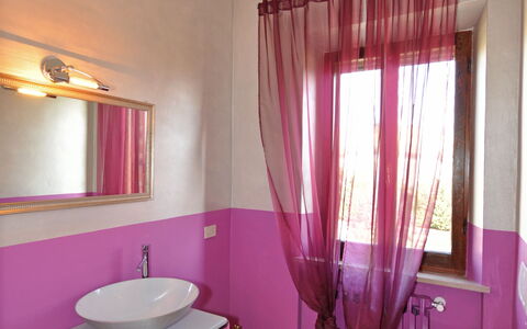 Villa Cassia: Bathroom, Room, Purple, Property, Interior Design, Pink, Curtain, Floor, Furniture, Building