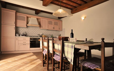 Casa Fabrizio: Furniture, Cabinetry, Table, Chair, Countertop, Wood, Interior Design, Floor, Kitchen, Wood Stain