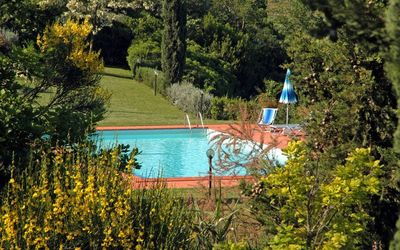 Le Colline: Water, Swimming Pool, Tree, Botany, Garden, Lake, Leisure, Botanical Garden, Landscape, House