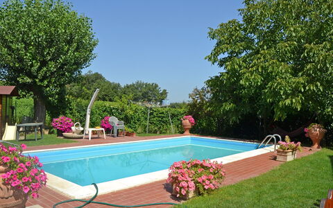 Casa Laura: Swimming Pool, Property, Backyard, Real Estate, Yard, Home, Grass, House, Leisure, Residential Area