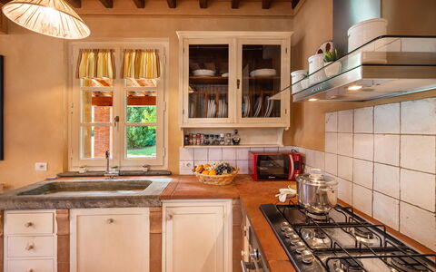 Le Vigne 6: Countertop, Cabinetry, Property, Kitchen Sink, Sink, Kitchen, Kitchen Stove, Tap, Gas Stove, Wood