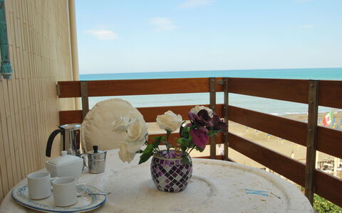 Marina Di Castagneto: Property, Room, Table, Furniture, Interior Design, Real Estate, Balcony, Vacation, Chair
