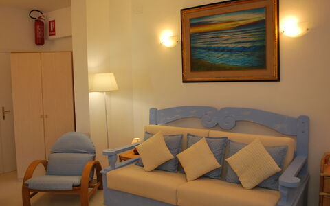 Marina Di Castagneto: Room, Furniture, Property, Living Room, Interior Design, Wall, Couch, Comfort, Table, Suite