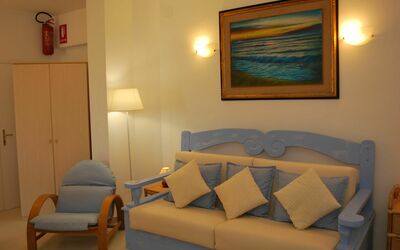 Murex: Room, Furniture, Property, Living Room, Interior Design, Wall, Couch, Comfort, Table, Suite