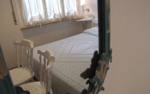 Villa Pineta: Property, Room, Floor, Window, Interior Design, Plaster, Hardwood, Stairs, Flooring, House
