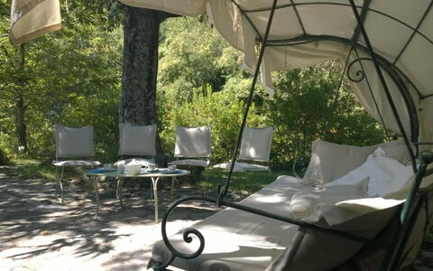 Villa La Quercia: Property, Iron, Furniture, Yard, Shade, Patio, Tree, Table, Backyard, House