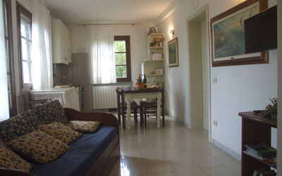 Erica: Picture Frame, Furniture, Table, Window, Couch, Building, Wood, Interior Design, Living Room, House