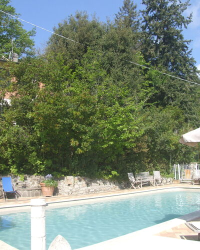 Villa La Quercia: Water, Plant, Sky, Building, Cloud, Azure, Swimming Pool, Tree, Outdoor Furniture, Shade