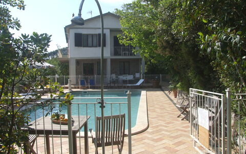 Villa Il Castagno: Plant, Property, Building, Sky, Water, Tree, Window, Fence, Shade, House
